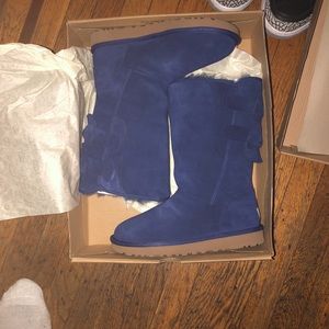 Ugg Tall boots with bow. Never worn before! Size 7
